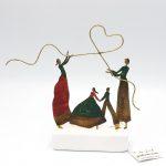 Οικογένεια με καρδιά σε βότσαλο