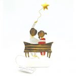 Ζευγάρι σε παγκάκι με αστεράκι