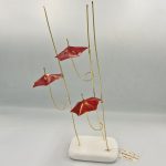 Διακοσμητικό ομπρέλες σε βότσαλο