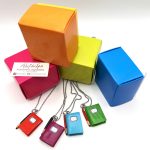 Μενταγιόν τετράδιο και μολύβι